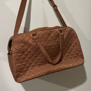 Quilted nylon duffle weekender. Shoulder strap included